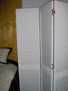 bifold doors repurposed as a room divider