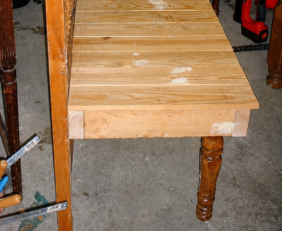 side view of baby bed bench
