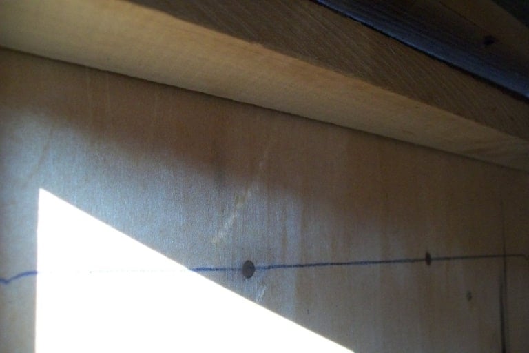 looking under the vanity to take it apart
