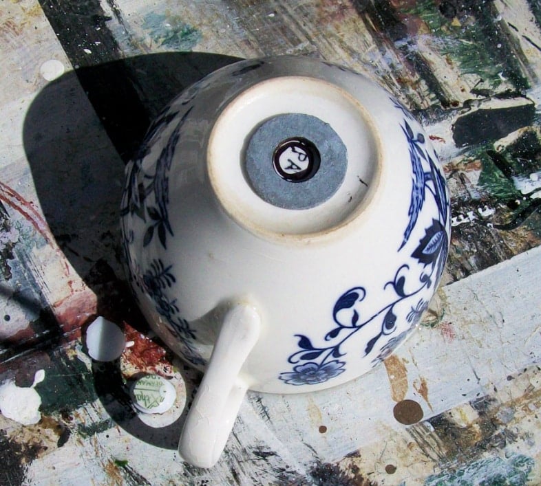 use a washer to mark teacup for drilling