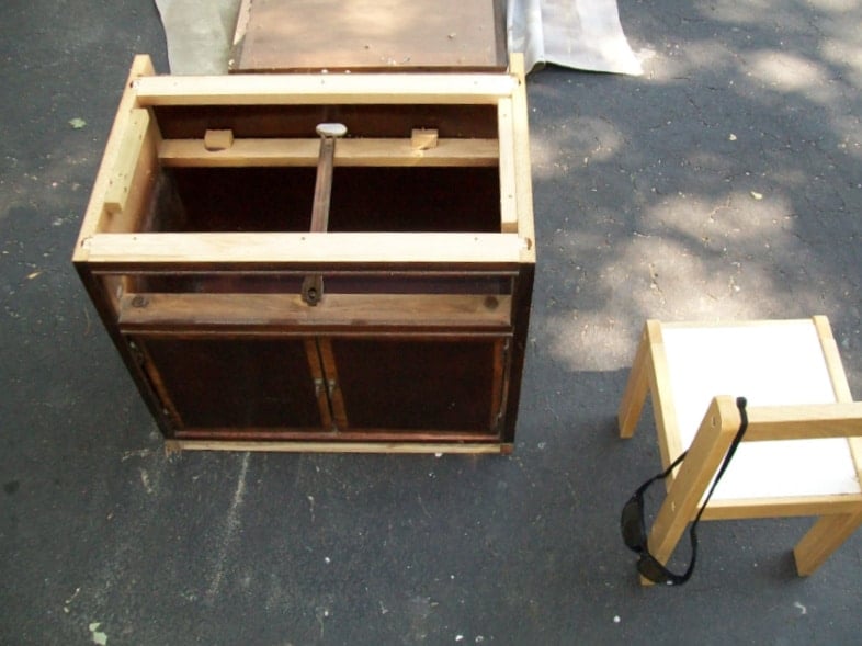 a nightstand with the top removed