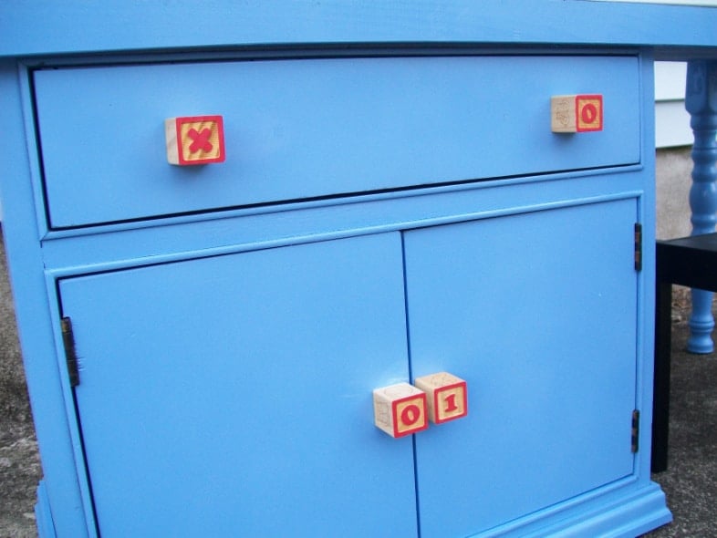 blue desk with building block knobs