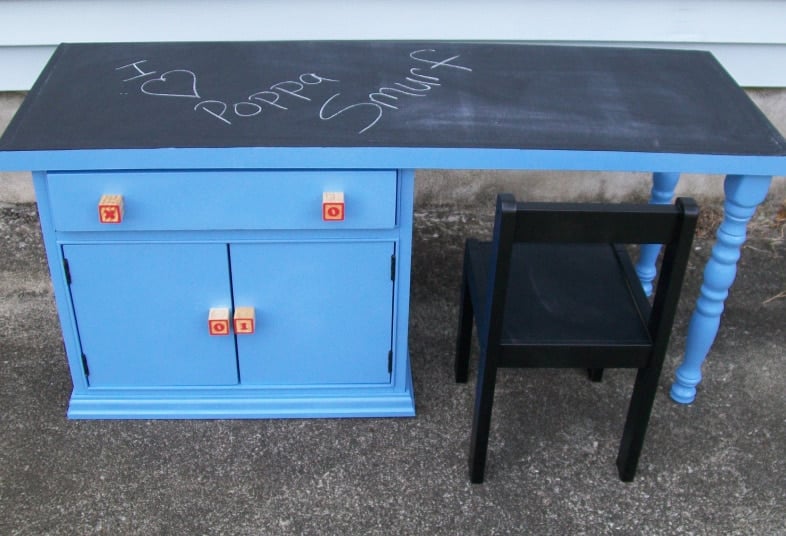 blue desk with chalkboard top and building block handles
