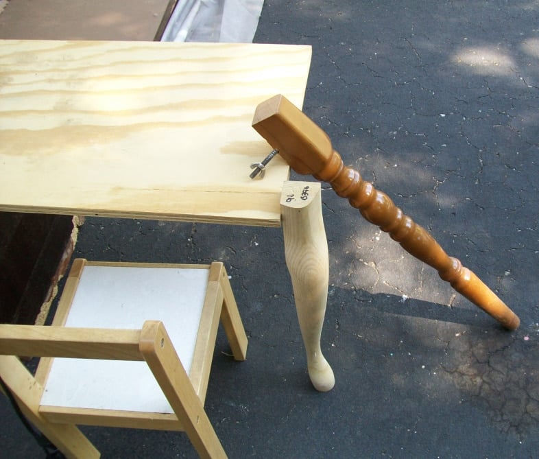 two different leg options laying against the new desk top