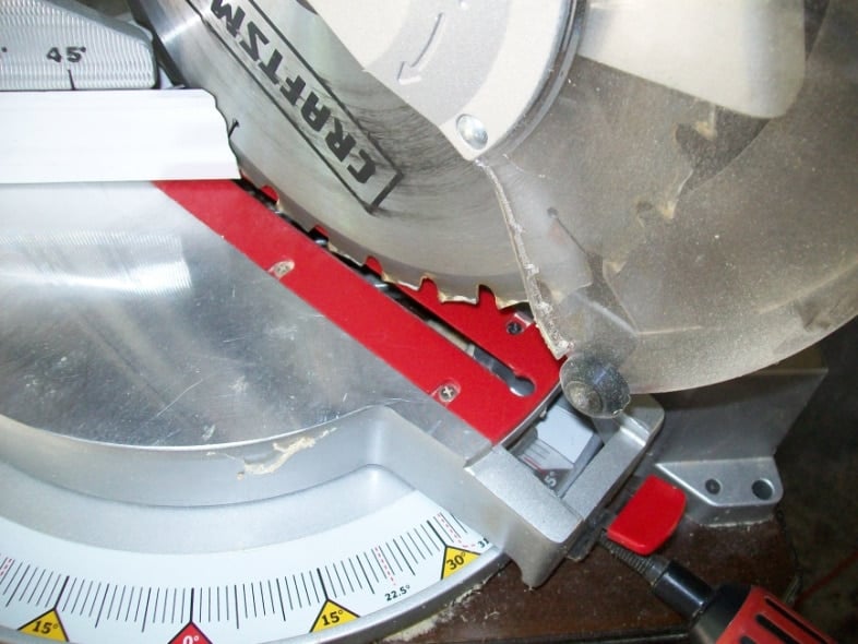 white trim molding on a miter saw