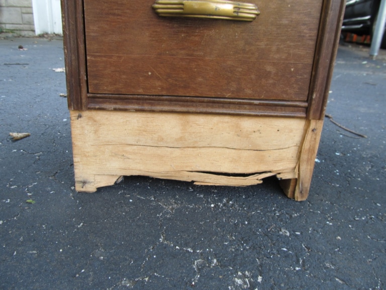 damage on front bottom of desk
