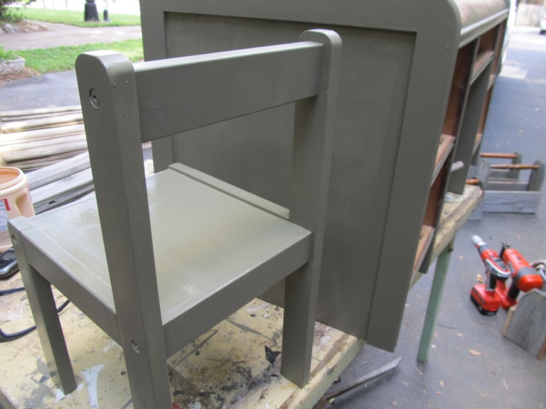 small green chair and desk ready for more paint