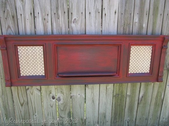 red piano front with sheet metal