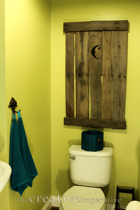 faux outhouse door decor for your powder room