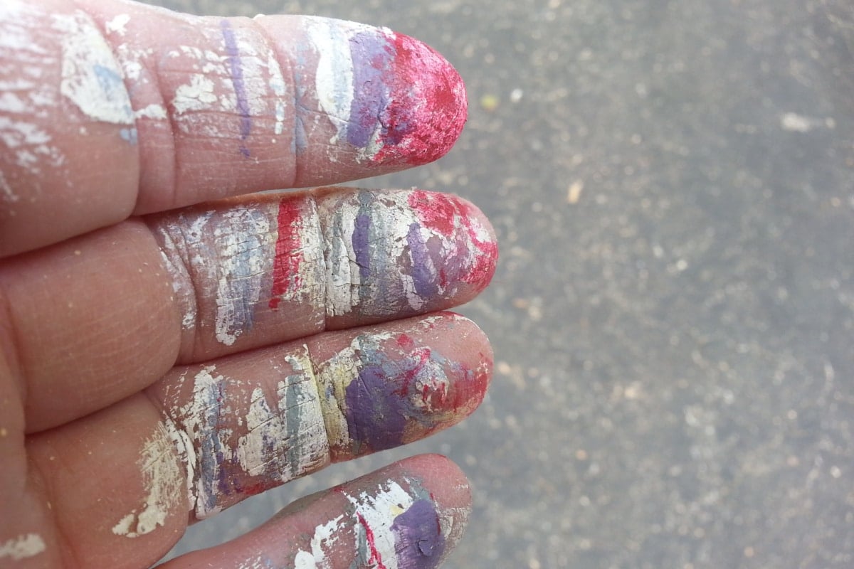 paint spattered fingers