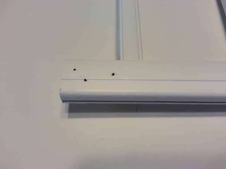 side rail with three small holes