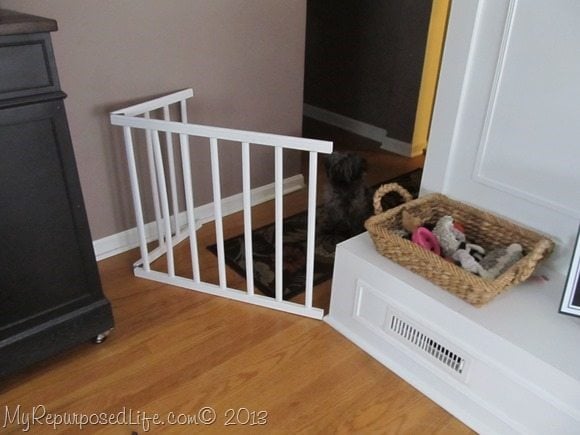 repurposed crib rails make a diy doggie gate