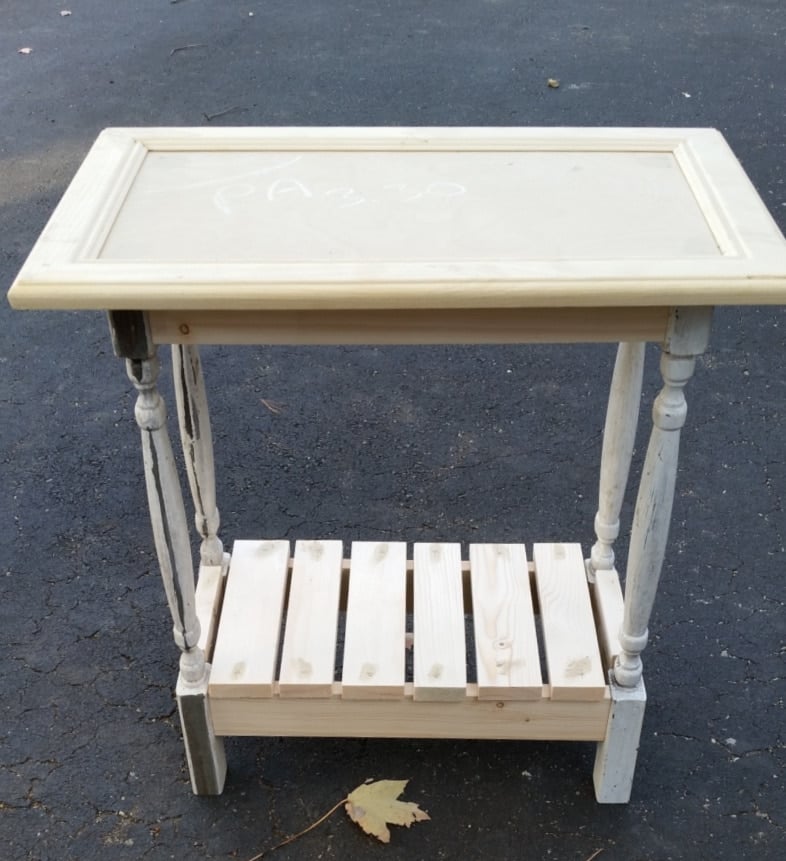cabinet door table with a bottom shelf