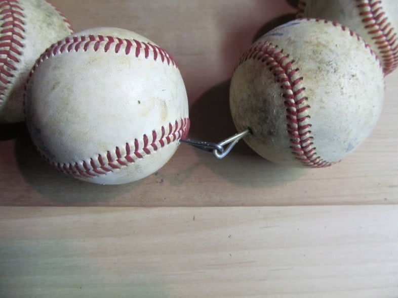 baseballs secure on wire