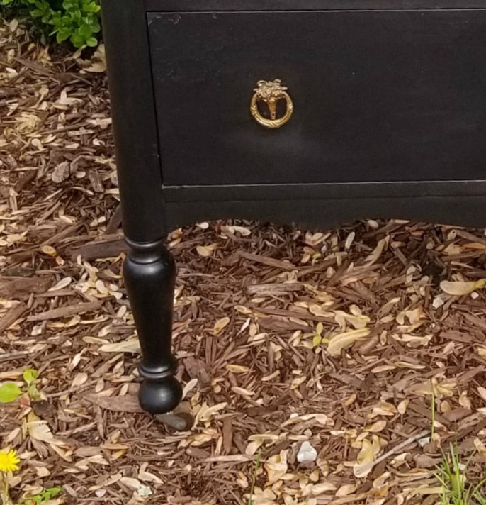 caster on antique chest of drawers makeover