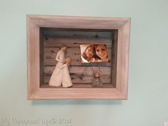 picture frame with collectables inside