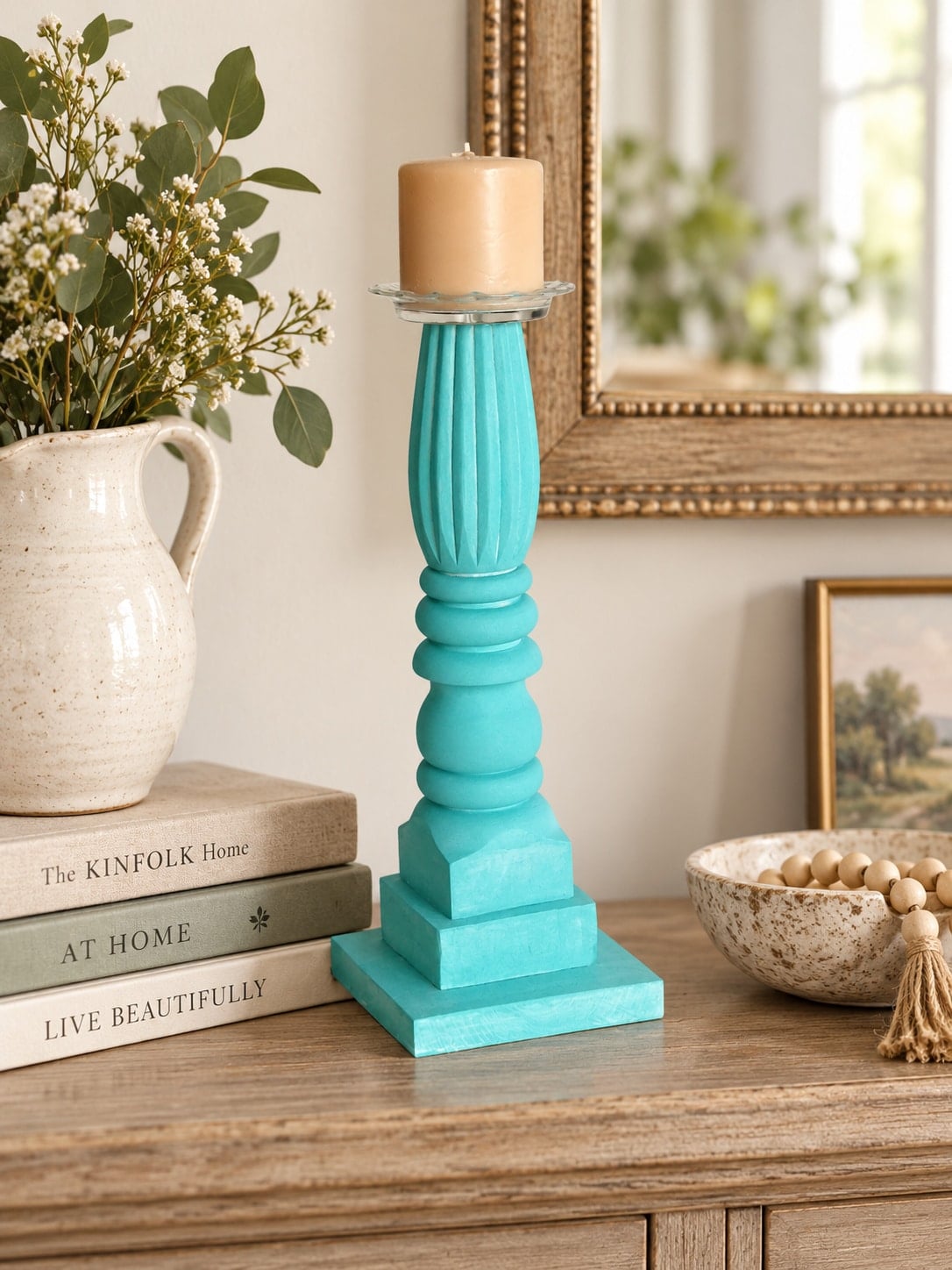 adding a small glass dish atop a DIY candlestick