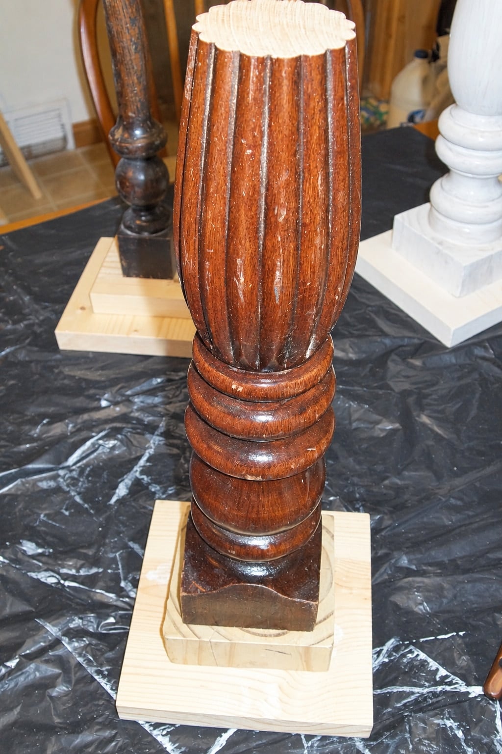 making a candlestick from a reclaimed bedpost