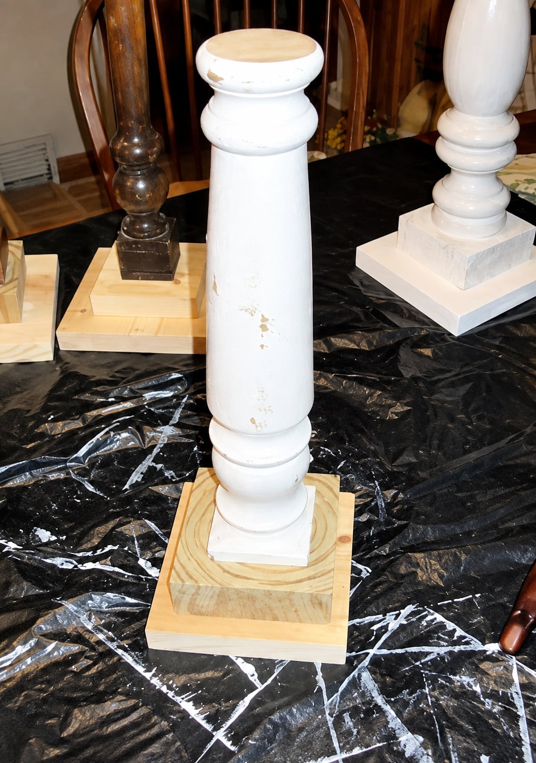 stacking odd scrap wood to make DIY candlesticks
