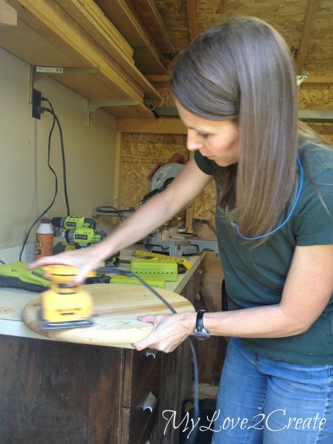 sanding round pine panel