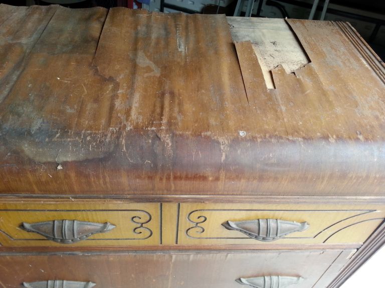 peeling veneer on top of dresser