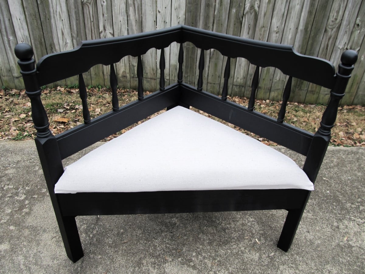 black corner bench with upholstered seat