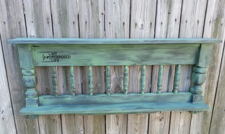 rustic green bed shelf hanging on a fence MyRepurposedLife