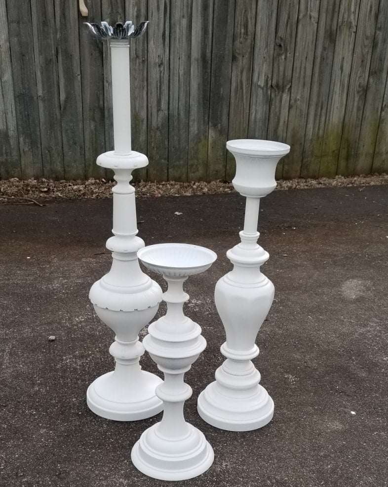 repurposed lamps into candlesticks and plant stands