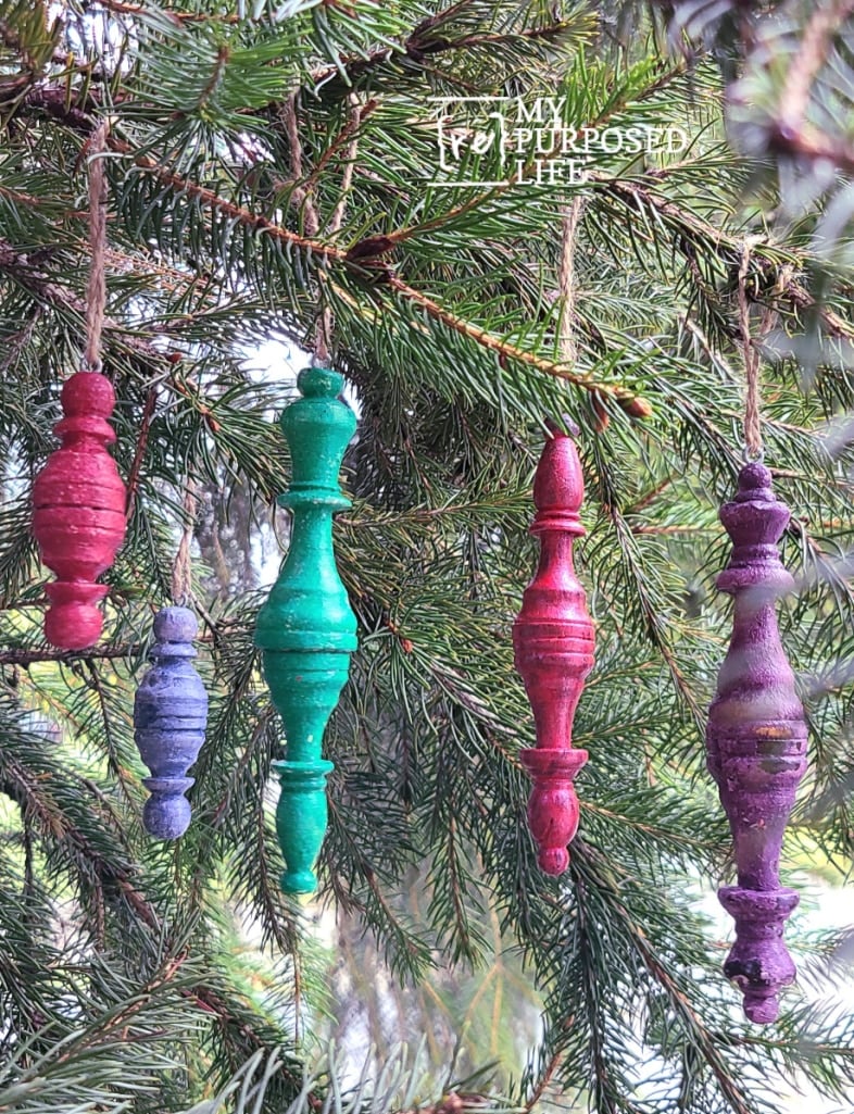 colorful spindle christmas ornaments hanging from a tree MyRepurposedLife