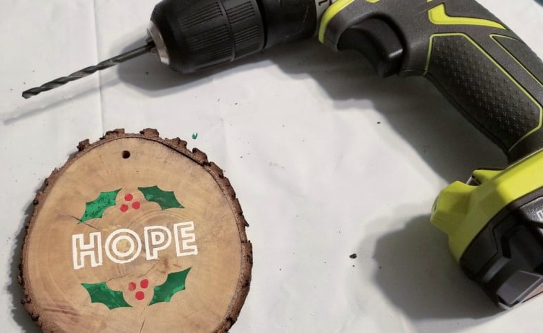 drill hole in wood slice ornament