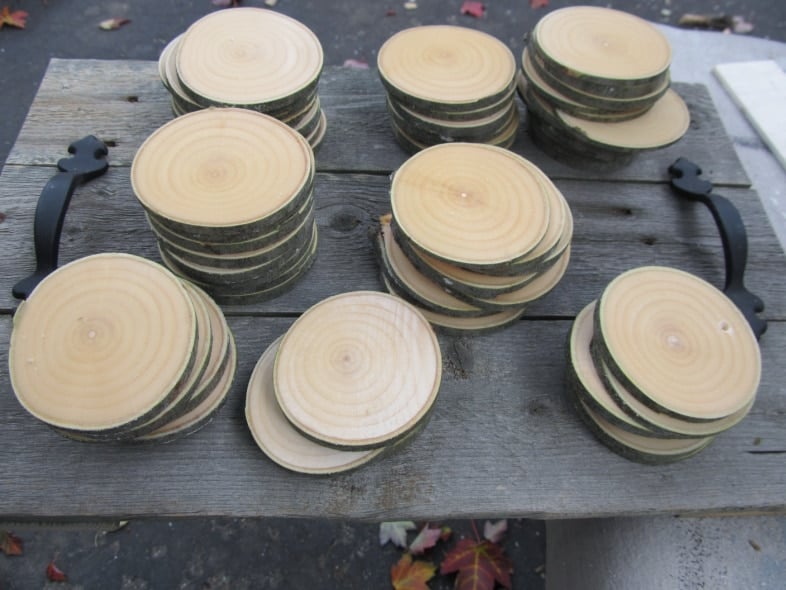 logs cut into ornaments