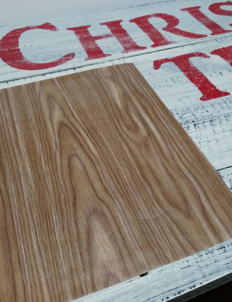 place stencil on sign