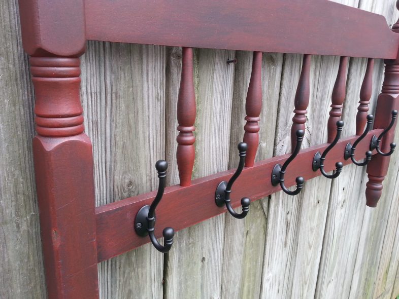 red footboard coat rack
