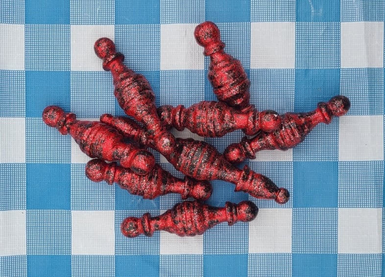 spindle ornaments with red glitter