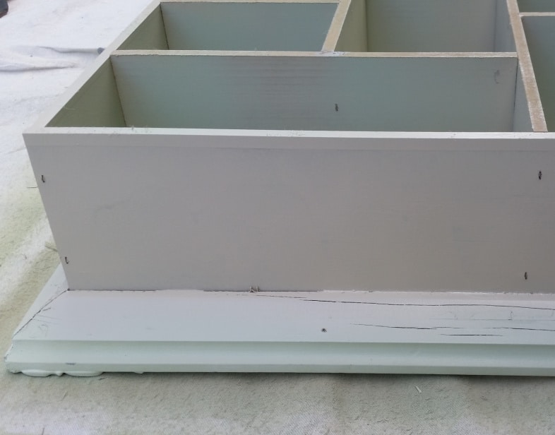 spray painting a picture frame shadow box