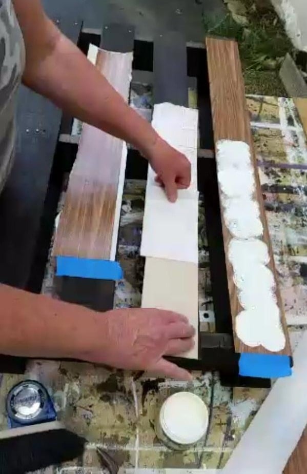 woman removing back of contact paper