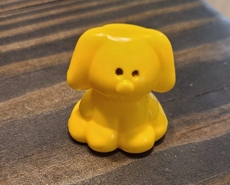 hard plastic yellow dog