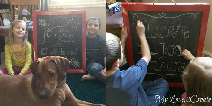  kids using chalkboard easel