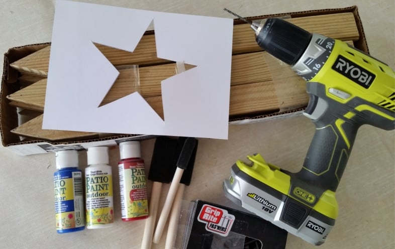 materials to make an easy flag project-garden stakes, paint, drill