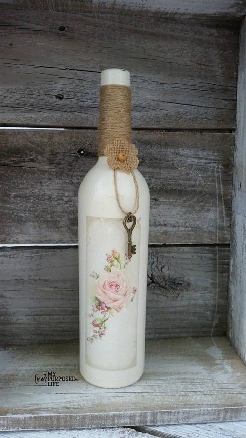 Repurpose some old wine bottles with some paint and an image transfer using a gel transfer medium. Great gift idea for the wine lover in your family. #MyRepurposedLife #repurposed #winebottle #imagetransfer #glassware via @repurposedlife