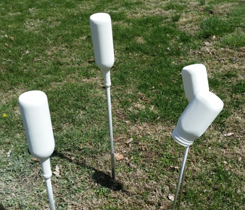 painted wine bottles and jars