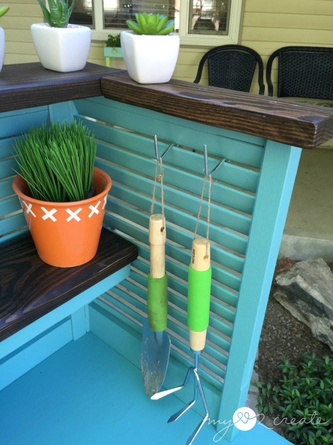 using pegboard hooks to hang tools