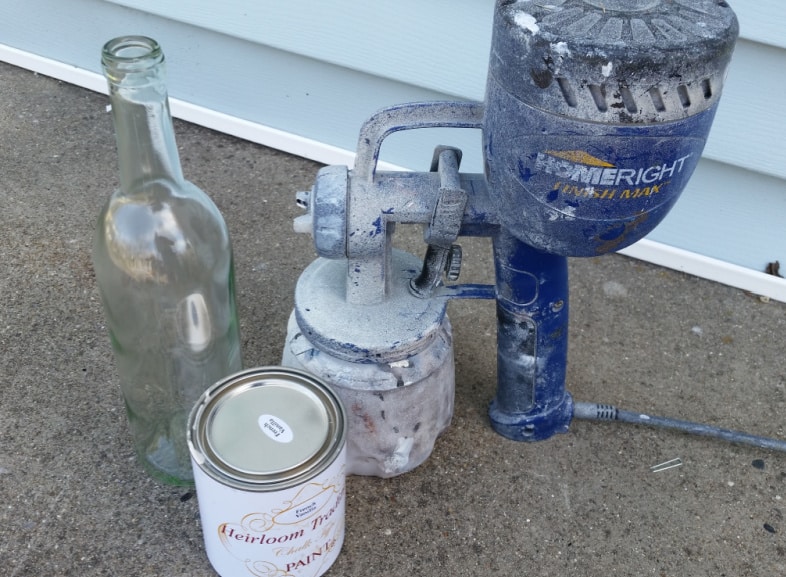 wine bottle and a finish max paint sprayer