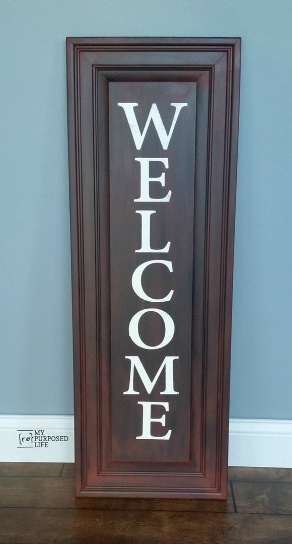My Repurposed Life easy WELCOME sign using an old cabinet door