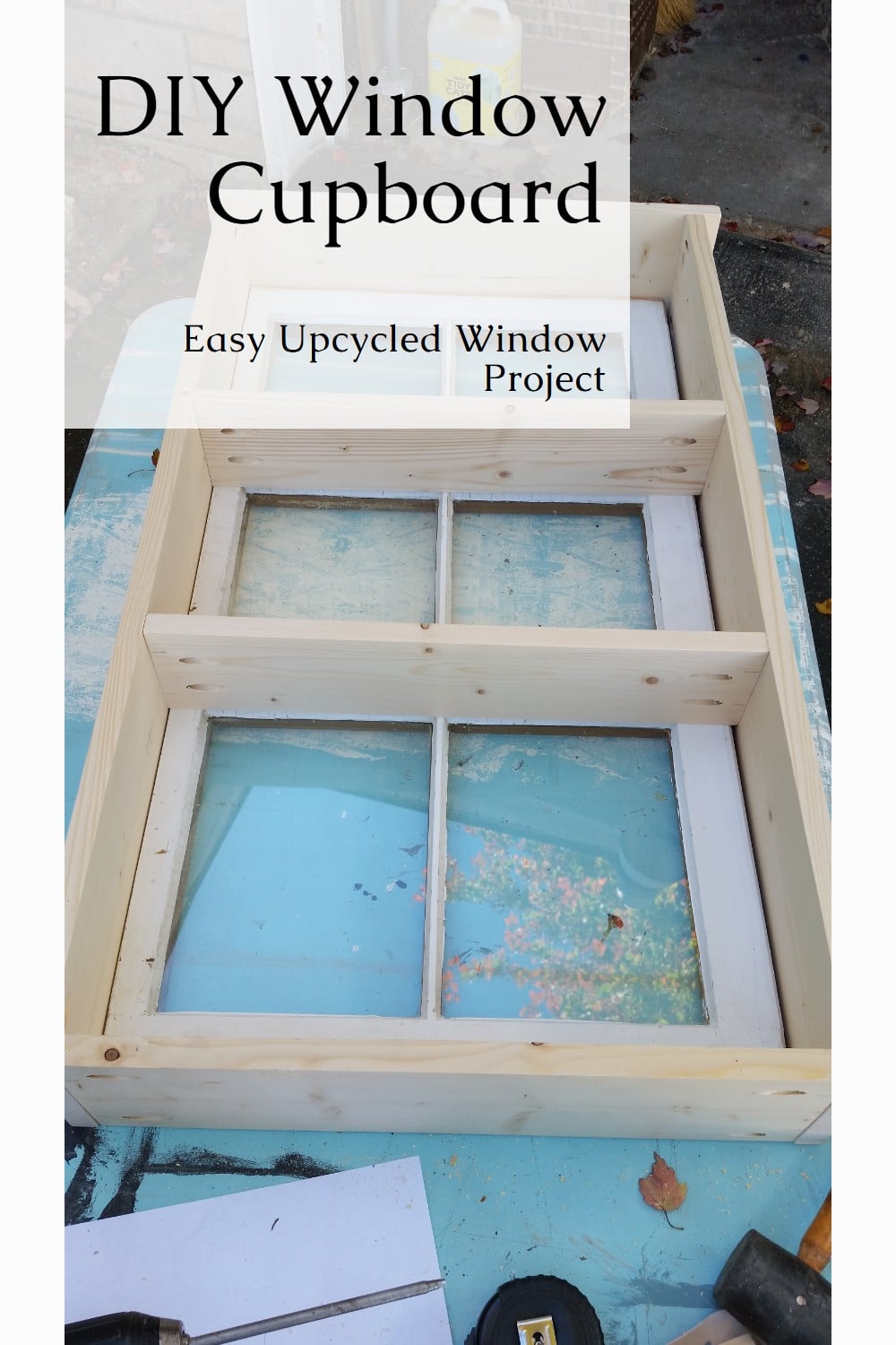Transform an old window into a charming cupboard with this simple DIY project! Perfect for upcycling and adding unique storage to your home. Get the step-by-step tutorial! via @repurposedlife