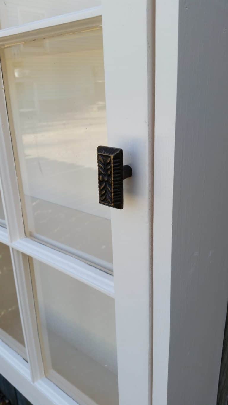oversized metal knob for window cabinet