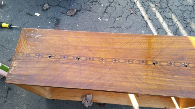 drawer with graffiti drawings removed using citristrip