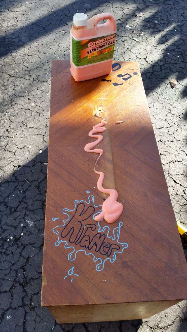 applying citristrip to a dresser drawer front