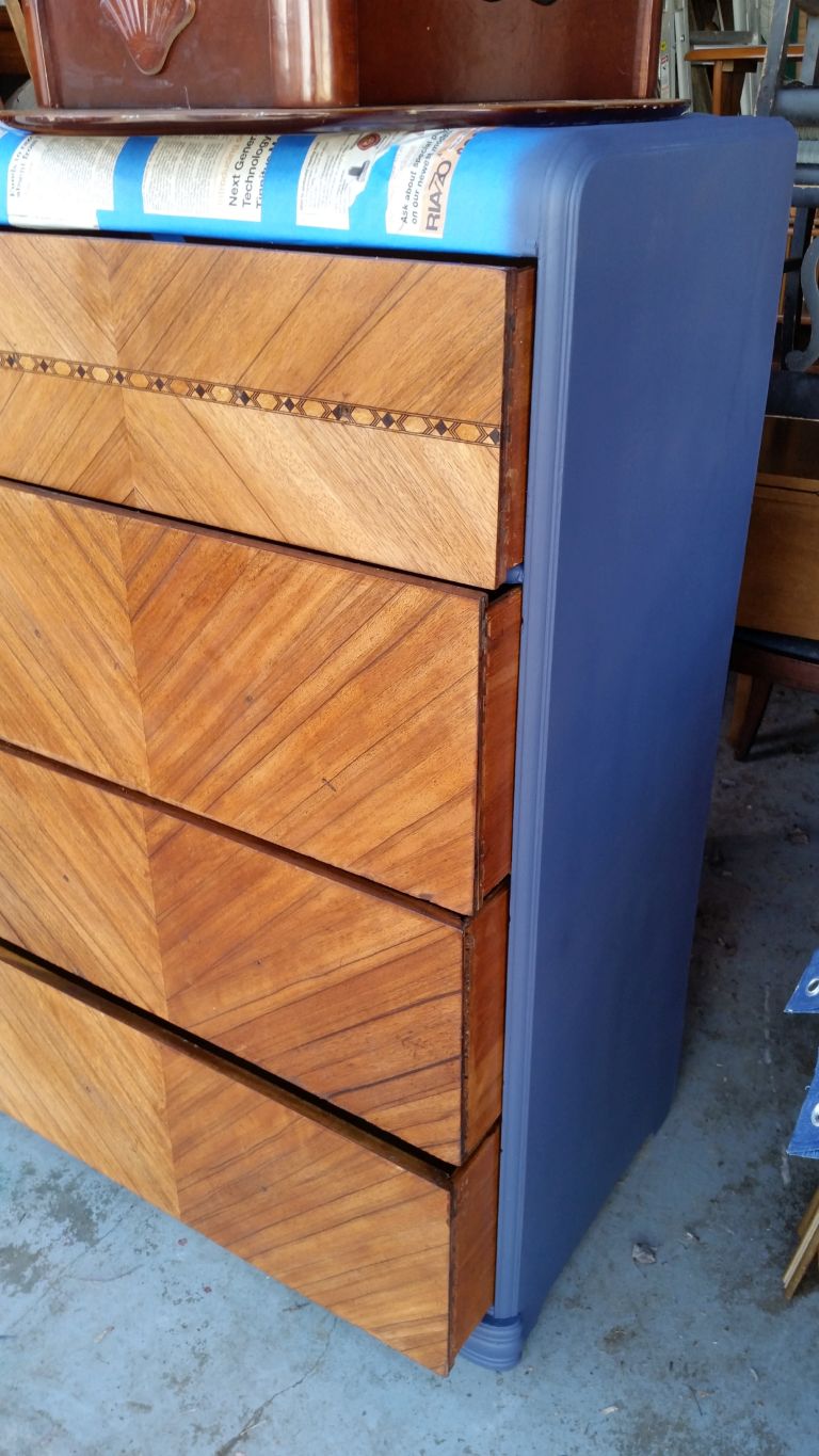 stained dresser with navy paint