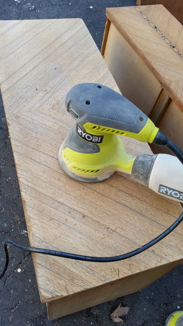 orbital sander on drawer